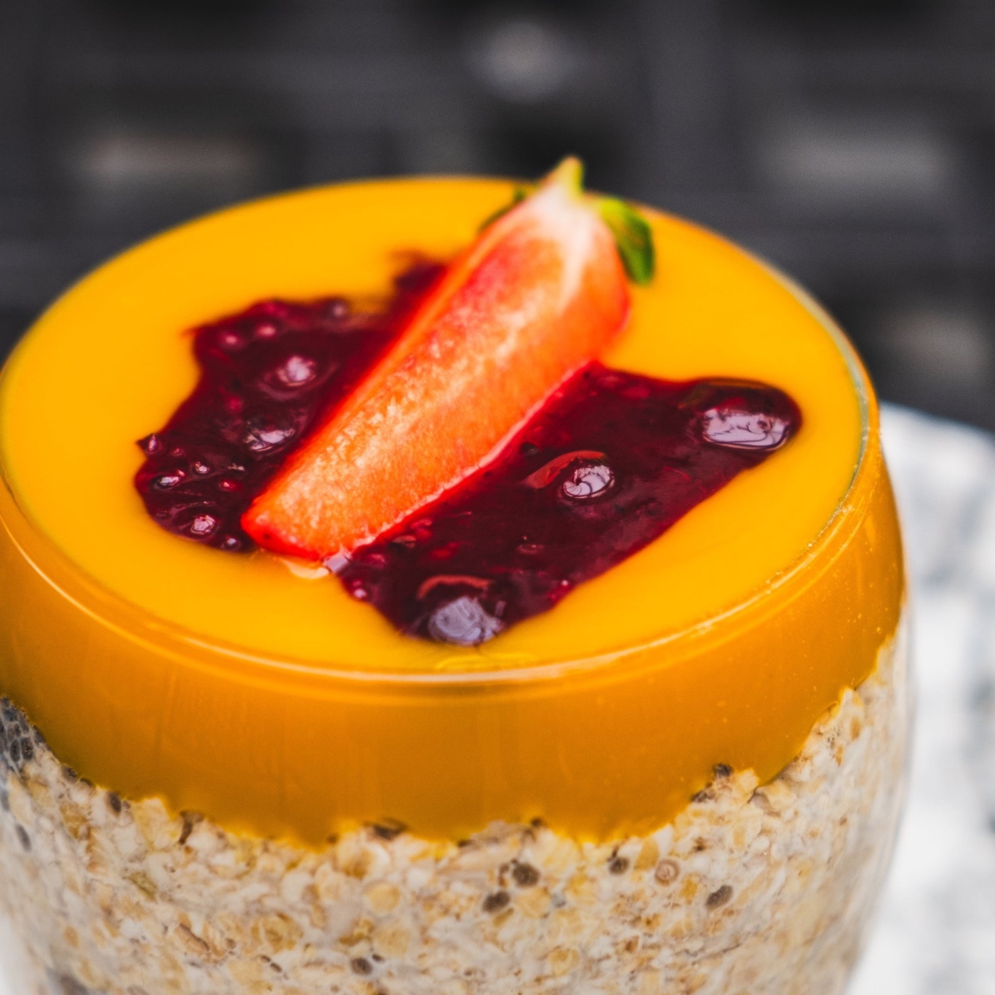 Mango and berry oat pot